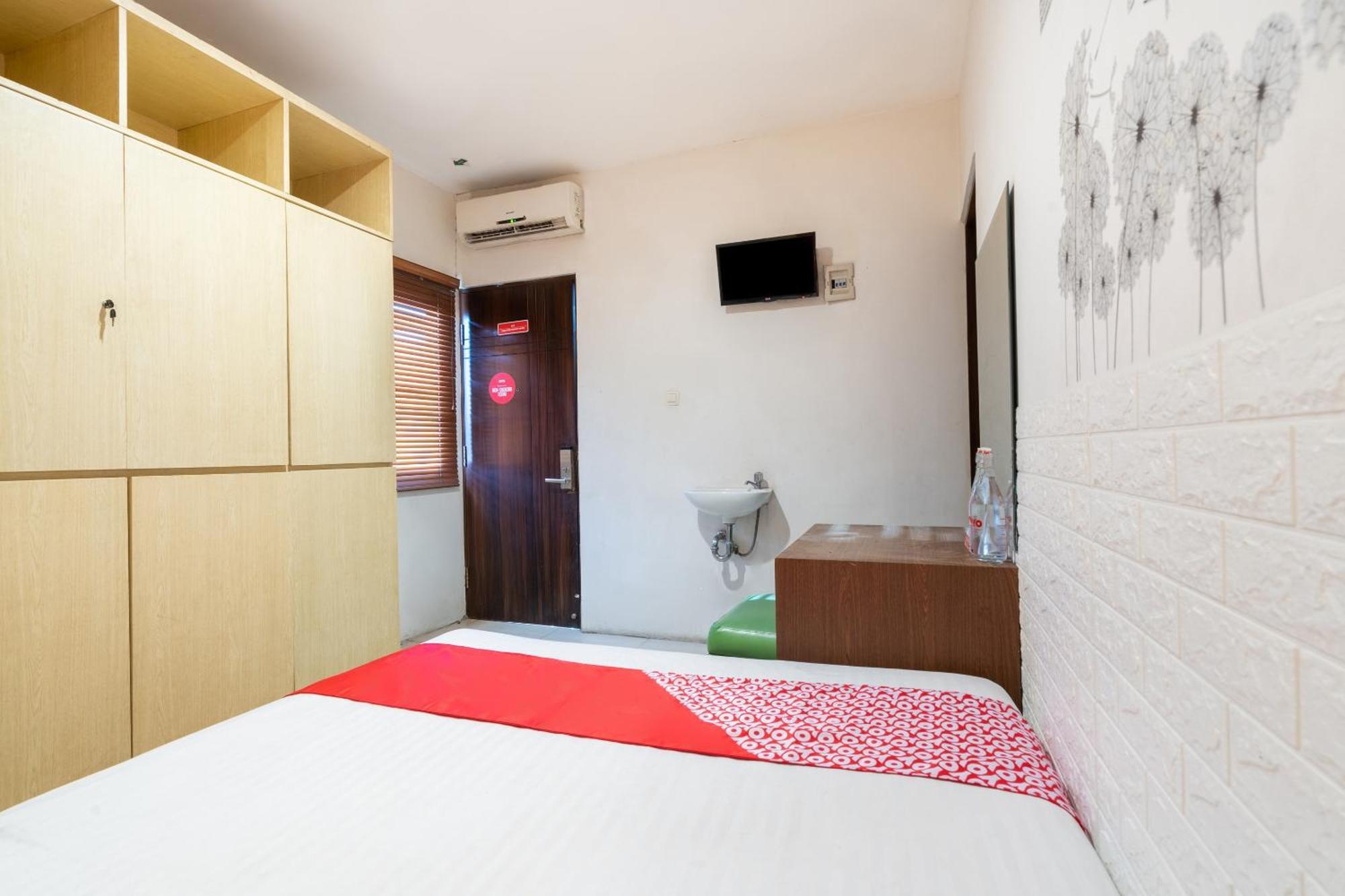 Super Oyo Flagship 91863 Metro House Hotel สุราบายา ภายนอก รูปภาพ
